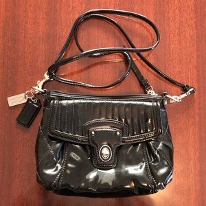 Small vintage black coach bag.